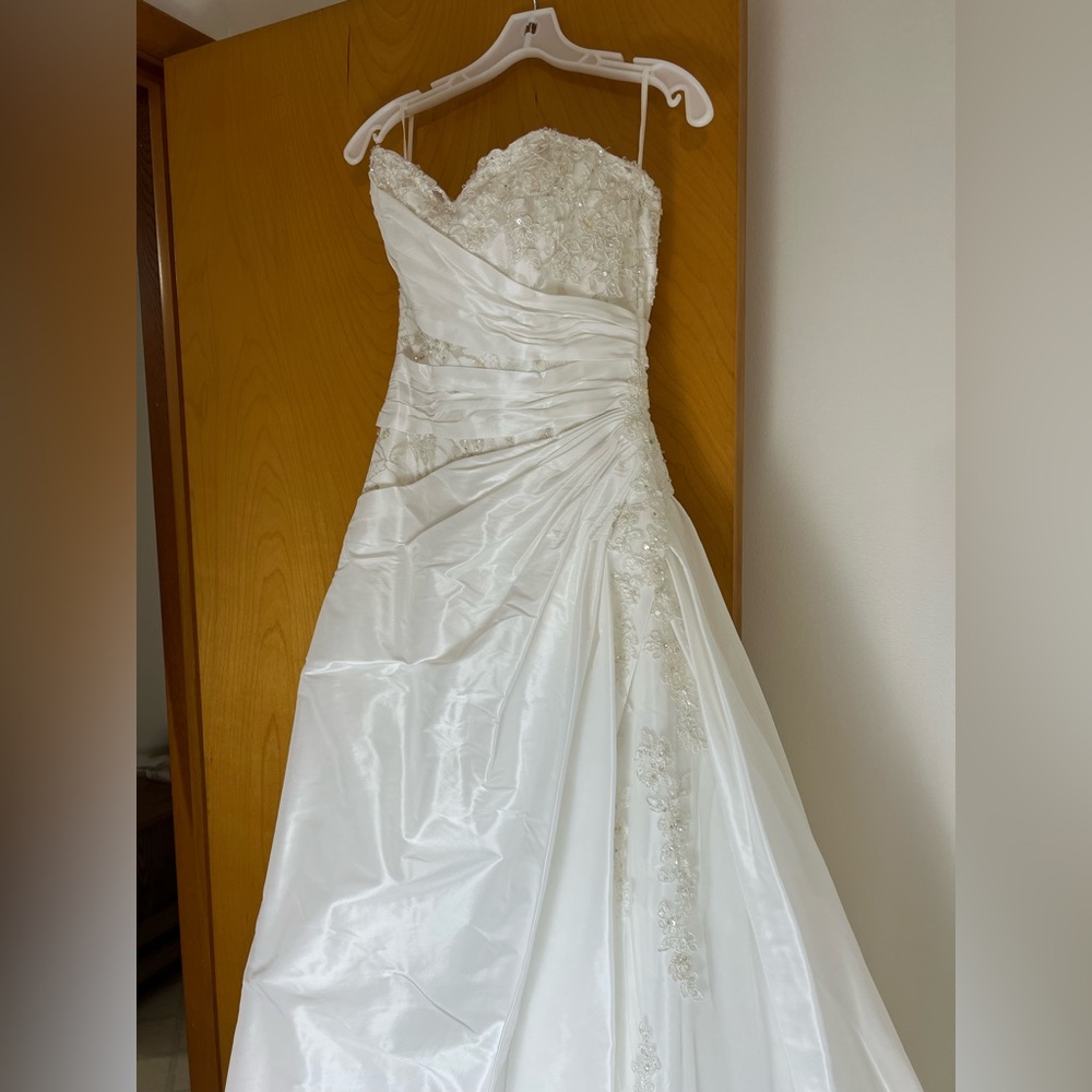 Ivory Sottero and Midgley couture wedding with corset back and train.